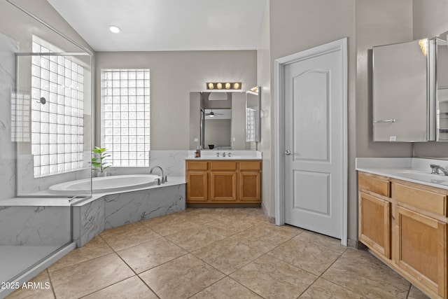 1244 W Straford Ave, Gilbert, AZ 85233 - bathroom featuring a garden tub, two vanities, and tile patterned floors
