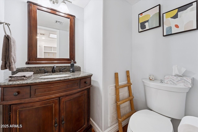 7835 E Cannon Dr, Scottsdale, AZ 85258 - half bathroom with toilet and vanity