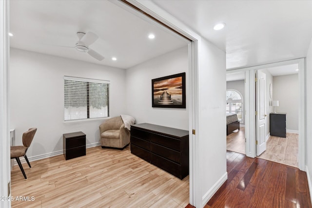 7835 E Cannon Dr, Scottsdale, AZ 85258 - living area with wood finished floors, ceiling fan, and recessed lighting