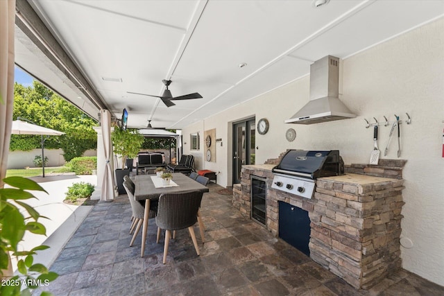 7835 E Cannon Dr, Scottsdale, AZ 85258 - view of patio / terrace with exterior kitchen, beverage cooler, outdoor dining space, and ceiling fan