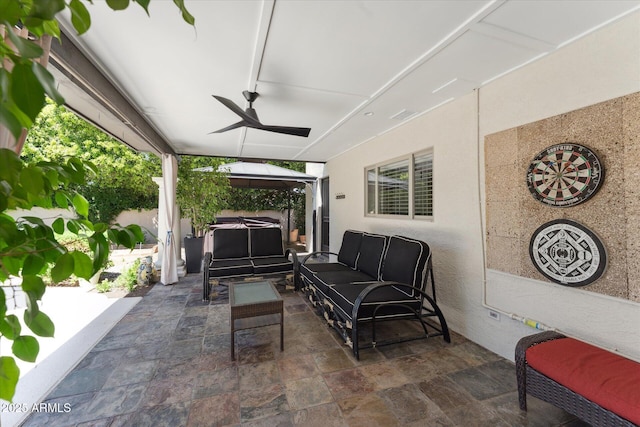 7835 E Cannon Dr, Scottsdale, AZ 85258 - view of patio / terrace with a hot tub, an outdoor living space, ceiling fan, and a gazebo