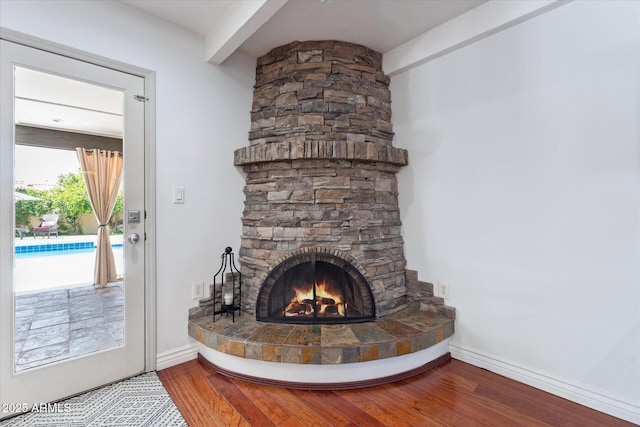7835 E Cannon Dr, Scottsdale, AZ 85258 - detailed view of wood finished floors and a stone fireplace