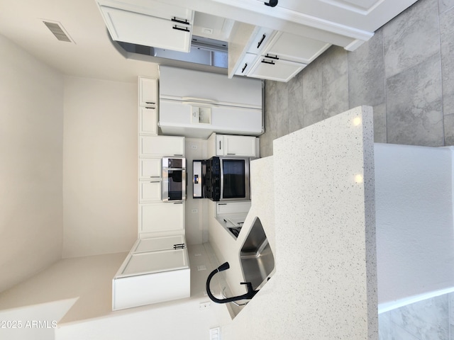 kitchen with white cabinetry