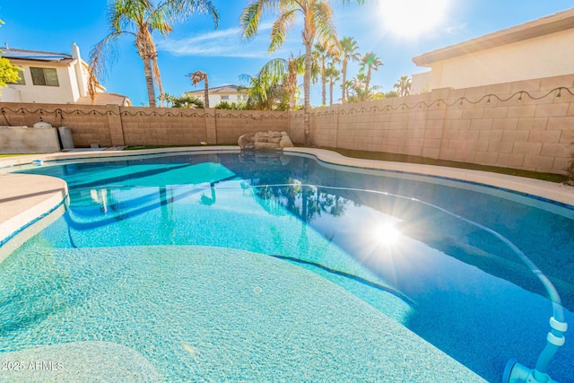 view of pool featuring a fenced in pool and a fenced backyard
