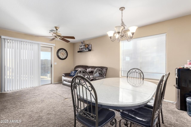 45 S 238th Dr, Buckeye, AZ 85396 - dining room featuring carpet floors, baseboards, visible vents, and ceiling fan with notable chandelier