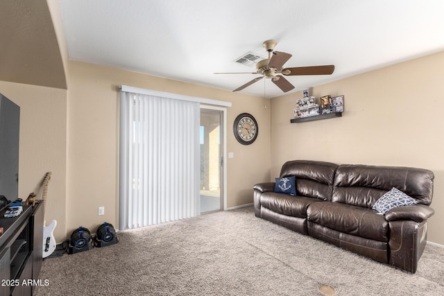 45 S 238th Dr, Buckeye, AZ 85396 - living room featuring carpet floors, visible vents, and a ceiling fan