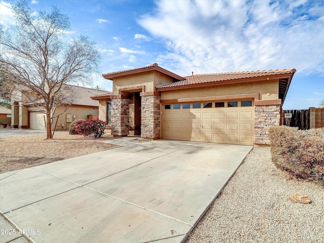 2706 N 115th Dr, Avondale, AZ 85392 - view of front facade featuring a garage