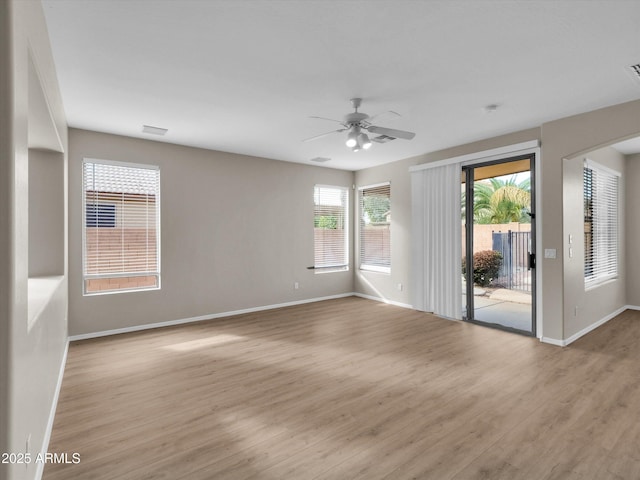 unfurnished room featuring ceiling fan and light hardwood / wood-style floors