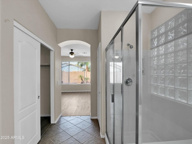 bathroom featuring tile patterned floors and ceiling fan