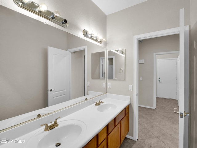 bathroom featuring tile patterned floors and vanity