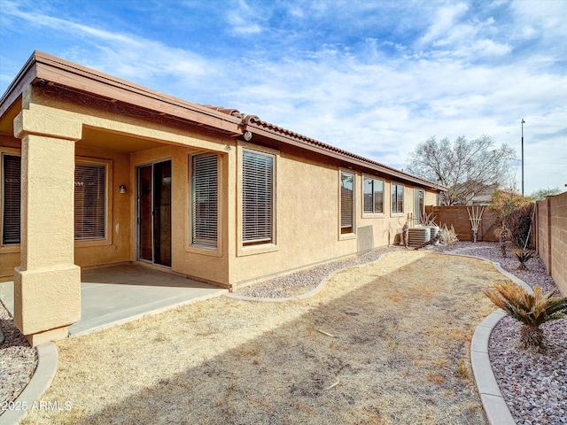 rear view of property with a patio area