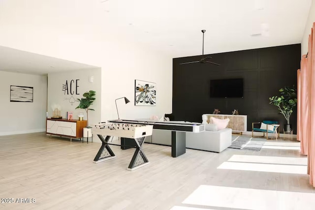 game room featuring ceiling fan and hardwood / wood-style floors