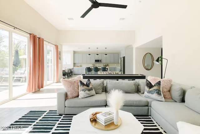 living room with ceiling fan