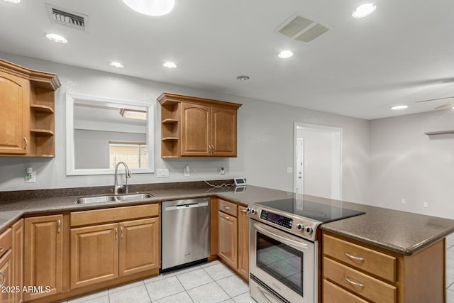 1240 E Indigo St, Mesa, AZ 85203 - kitchen featuring stainless steel appliances, open shelves, visible vents, and a sink