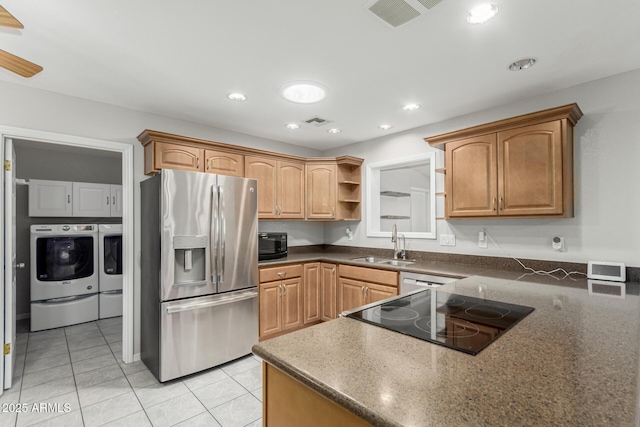 1240 E Indigo St, Mesa, AZ 85203 - kitchen featuring stovetop, independent washer and dryer, open shelves, a sink, and stainless steel fridge with ice dispenser