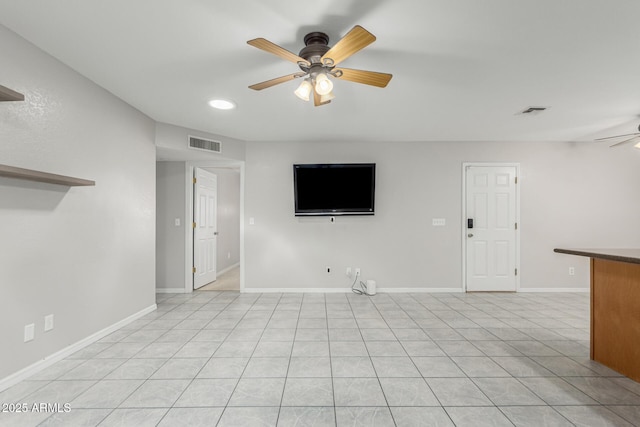 1240 E Indigo St, Mesa, AZ 85203 - unfurnished living room featuring light tile patterned floors, baseboards, a ceiling fan, and visible vents