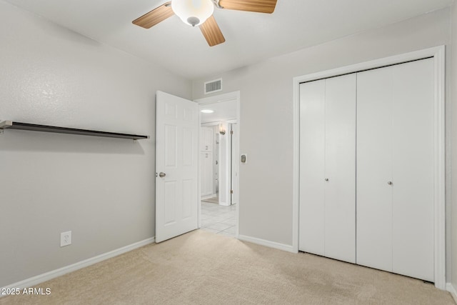 1240 E Indigo St, Mesa, AZ 85203 - unfurnished bedroom featuring baseboards, visible vents, carpet, and a closet