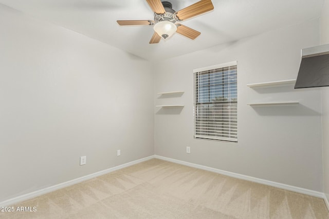 1240 E Indigo St, Mesa, AZ 85203 - empty room with baseboards, a ceiling fan, and carpet flooring