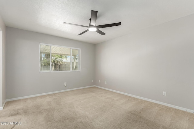 1240 E Indigo St, Mesa, AZ 85203 - unfurnished room featuring ceiling fan, light carpet, and baseboards