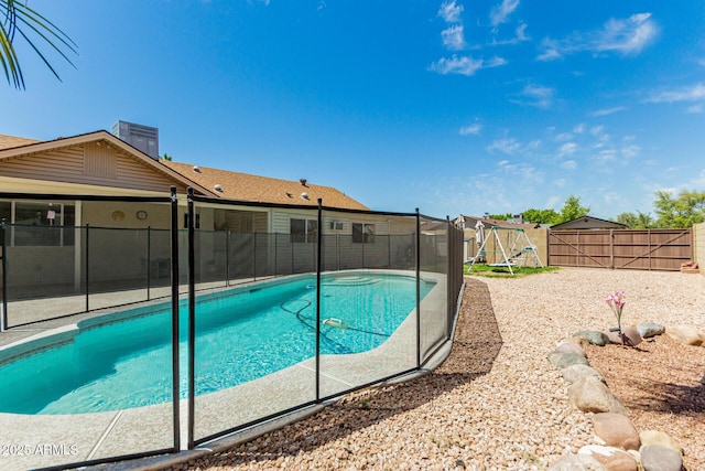 1240 E Indigo St, Mesa, AZ 85203 - view of swimming pool with a fenced in pool and a fenced backyard