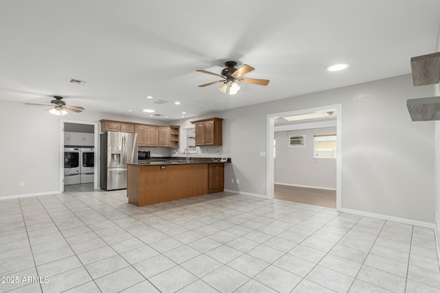 1240 E Indigo St, Mesa, AZ 85203 - kitchen with stainless steel refrigerator with ice dispenser, a ceiling fan, a peninsula, and visible vents