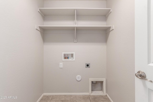 laundry area with electric dryer hookup, baseboards, gas dryer hookup, laundry area, and washer hookup