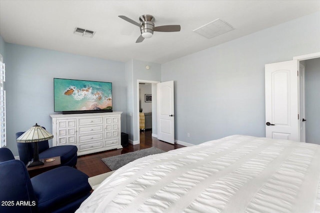 bedroom featuring ceiling fan and dark hardwood / wood-style flooring