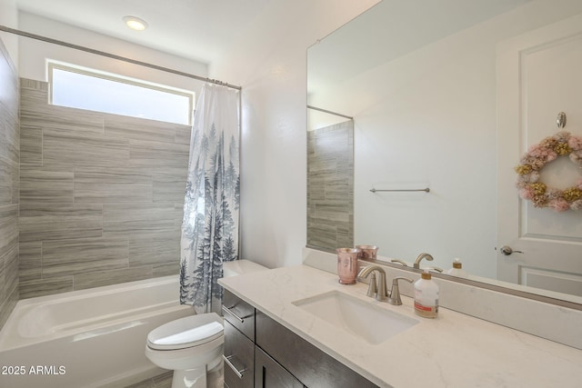 full bath featuring vanity, toilet, and shower / bathtub combination with curtain