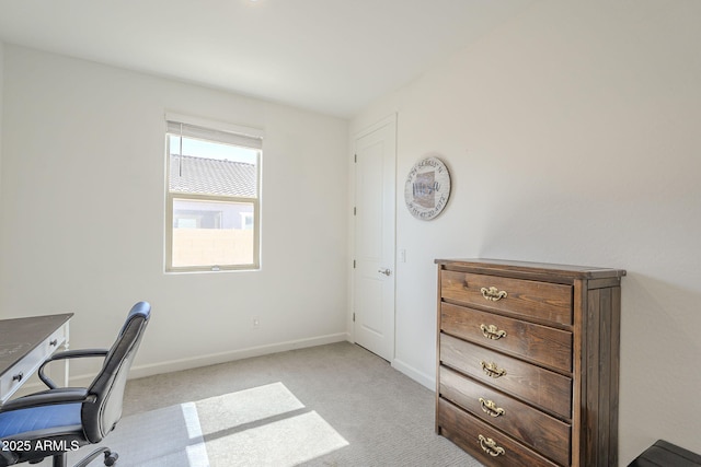 office featuring light carpet and baseboards