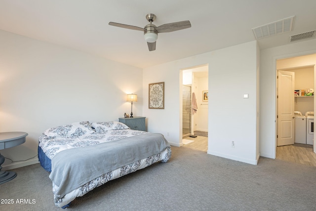 bedroom with baseboards, visible vents, washer and dryer, and carpet flooring