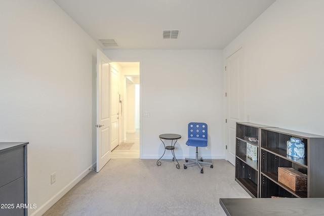 interior space featuring carpet flooring, visible vents, and baseboards