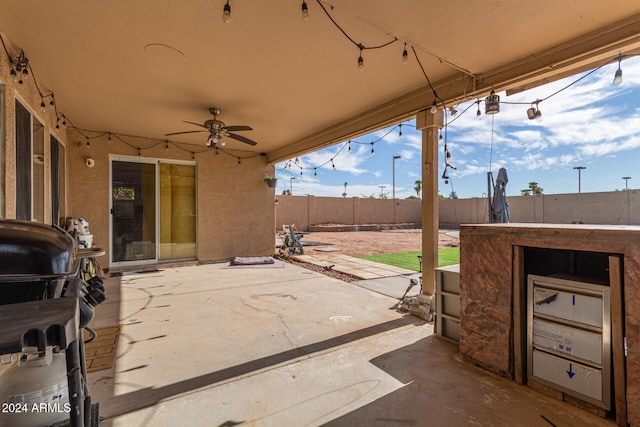 view of patio / terrace featuring ceiling fan