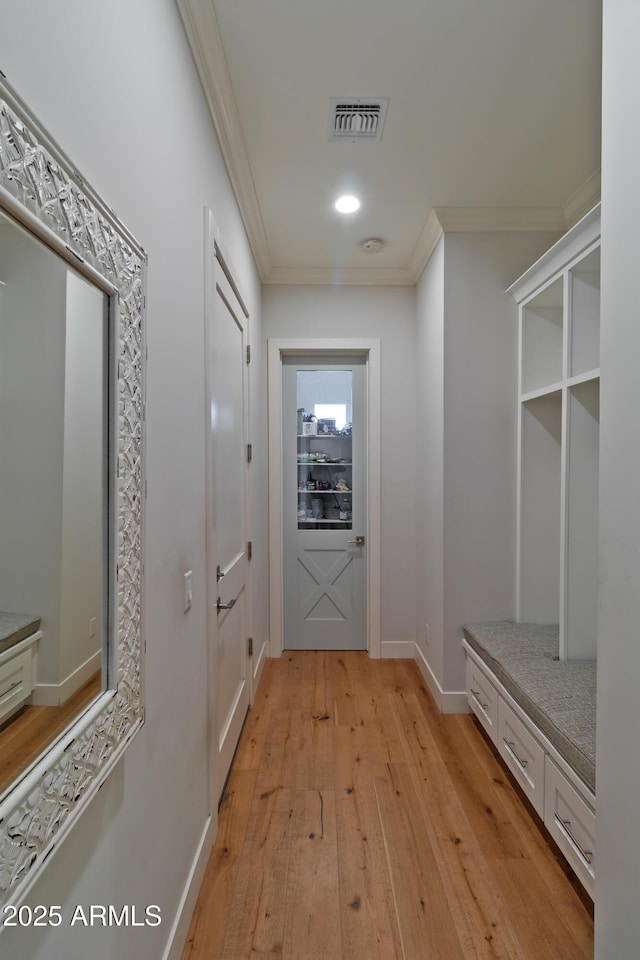 3813 N 37th St, Phoenix, AZ 85018 - mudroom with ornamental molding, light wood-style flooring, and baseboards