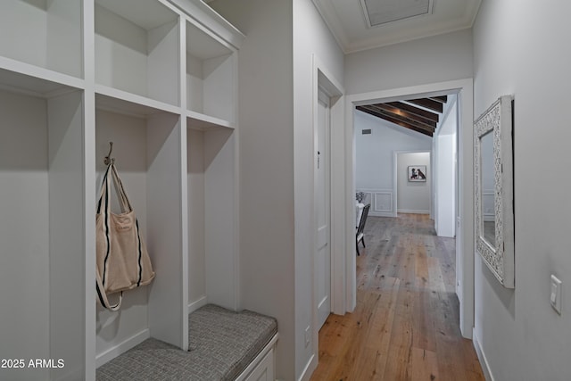 3813 N 37th St, Phoenix, AZ 85018 - mudroom featuring light wood-style flooring, vaulted ceiling, and ornamental molding