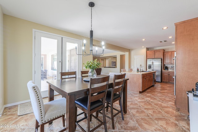 2514 E Grand Canyon Dr, Chandler, AZ 85249 - dining space featuring a chandelier and recessed lighting