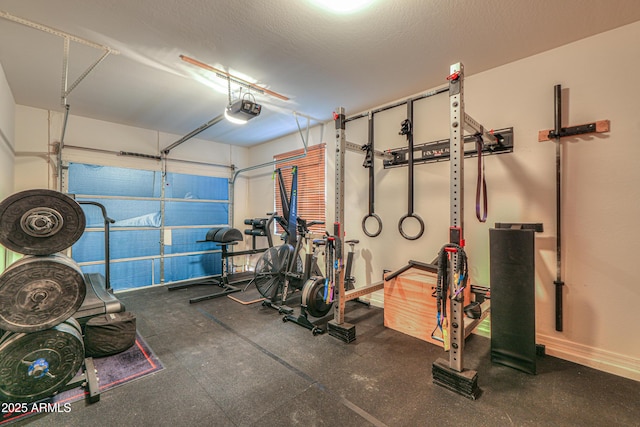 2514 E Grand Canyon Dr, Chandler, AZ 85249 - workout room featuring a garage and baseboards