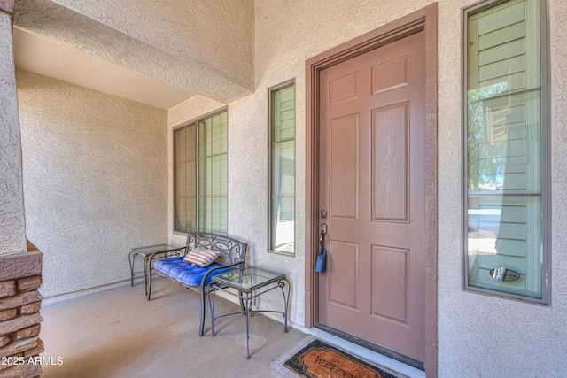 2514 E Grand Canyon Dr, Chandler, AZ 85249 - doorway to property with stucco siding and covered porch