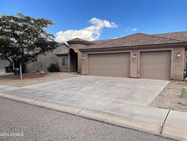 view of front of home featuring a garage