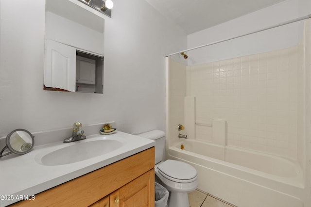 full bath with shower / bathing tub combination, vanity, toilet, and tile patterned floors