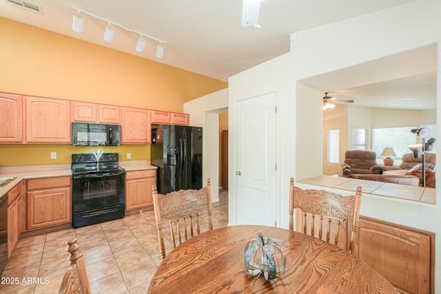 103 S Birdie Way, Casa Grande, AZ 85194 - kitchen featuring black appliances, ceiling fan, light brown cabinets, light tile patterned floors, and light countertops