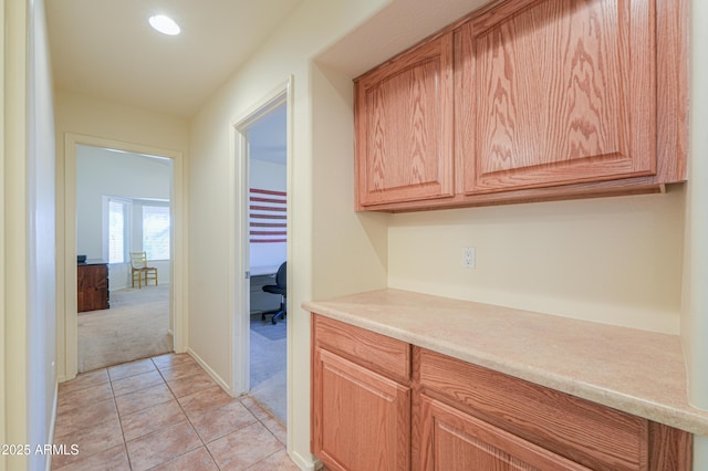 103 S Birdie Way, Casa Grande, AZ 85194 - kitchen with light carpet, an office area, light countertops, light tile patterned flooring, and recessed lighting