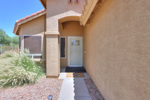 103 S Birdie Way, Casa Grande, AZ 85194 - view of exterior entry featuring stucco siding