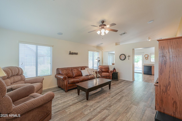103 S Birdie Way, Casa Grande, AZ 85194 - living room featuring ceiling fan, light wood-style floors, and lofted ceiling