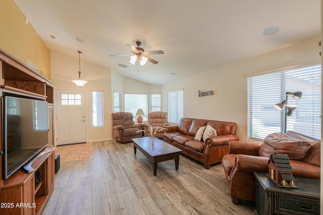 103 S Birdie Way, Casa Grande, AZ 85194 - living room with vaulted ceiling, light wood-type flooring, and a ceiling fan