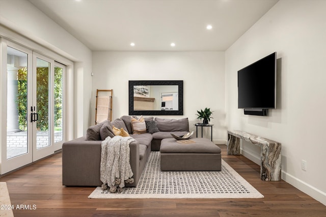 living room with french doors and dark hardwood / wood-style flooring