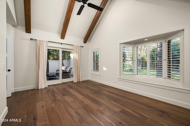 unfurnished room featuring ceiling fan, dark hardwood / wood-style floors, beam ceiling, and high vaulted ceiling