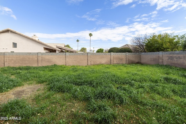 view of yard featuring fence