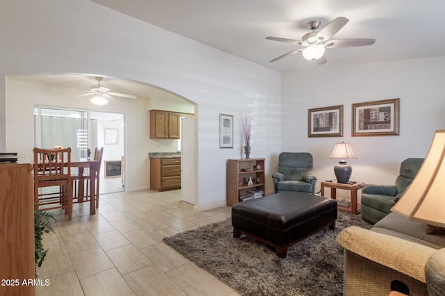 living room featuring ceiling fan