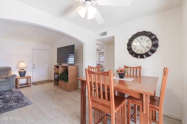 dining space featuring ceiling fan