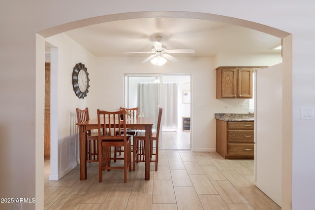 dining space with ceiling fan